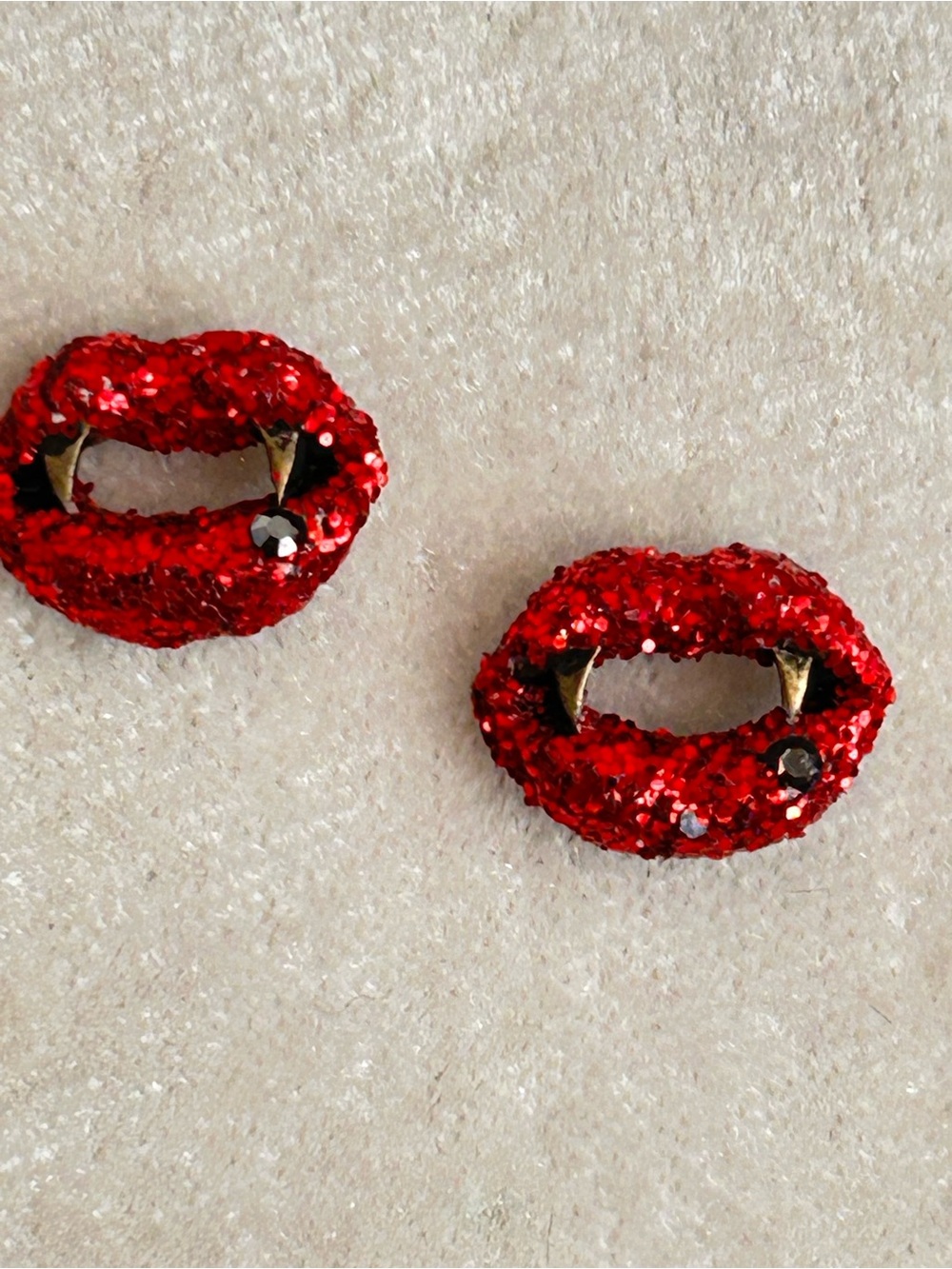 Betsey Johnson “Bite Me” stud earrings